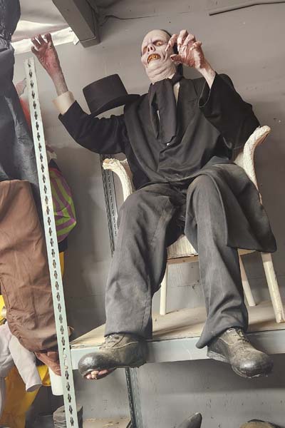 Sitting Scary decrepit dude