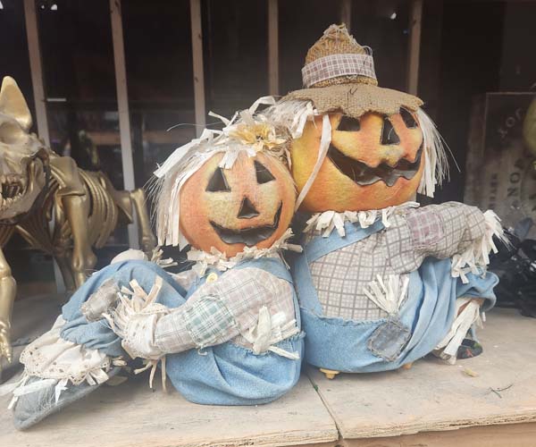 Sitting pumpkin scarecrows