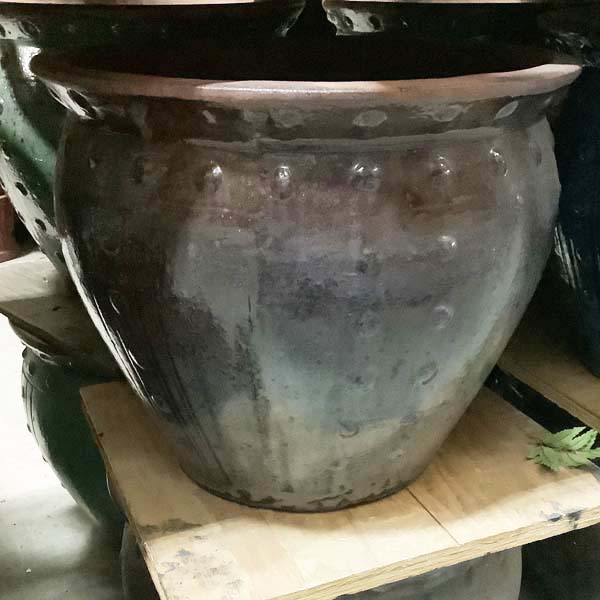 Glazed Rust Fishbowl Rivet Pattern